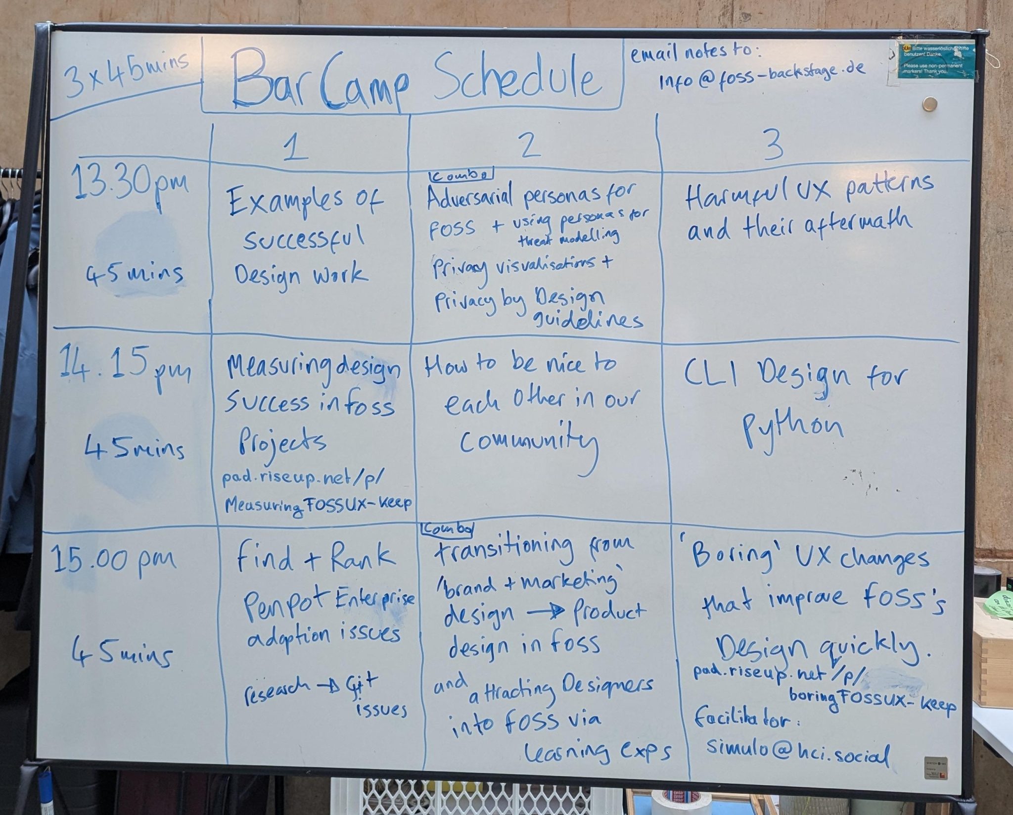 The schedule written on a whiteboard
